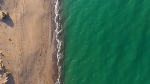 Drone view of beautiful seamless never ending footage while turquiose sea waves Stock Footage 127110705