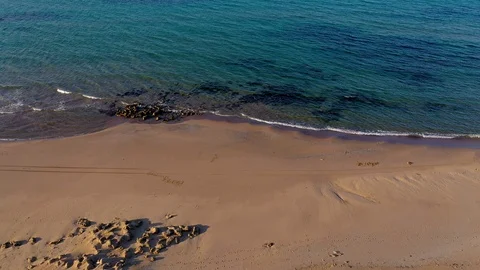 Drone view of beautiful seamless never ending footage while turquiose sea waves Stock Footage 127154482