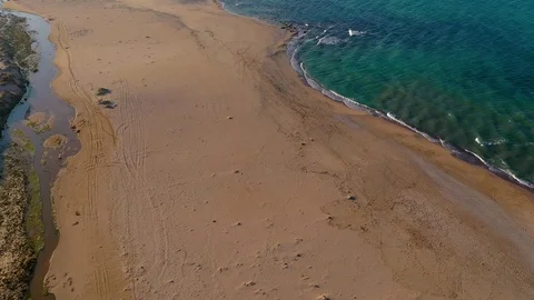 Drone view of beautiful seamless never ending footage while turquiose sea waves Stock Footage 127154614