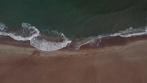 Drone view of beautiful seamless never ending footage while turquiose sea waves Stock Footage 138468258