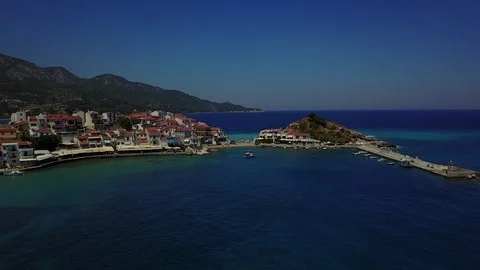 Drone view of beautiful small touristic harbor of Kokkari Samos island 動画素材 114557632