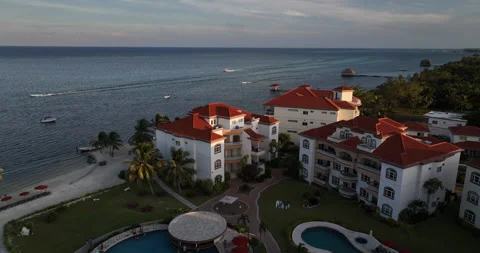 Drone View of Belize Vacation Resort Along Caribbean Island Coastline at Sunset 스톡 동영상 300362272