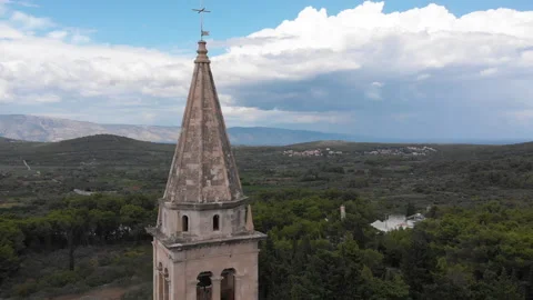 Drone view of a bell tower in the mountains 05 Video stock 139761218