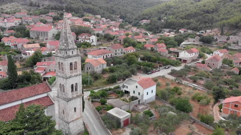 Drone view of a bell tower in the mountains 01 Video stock 139761538