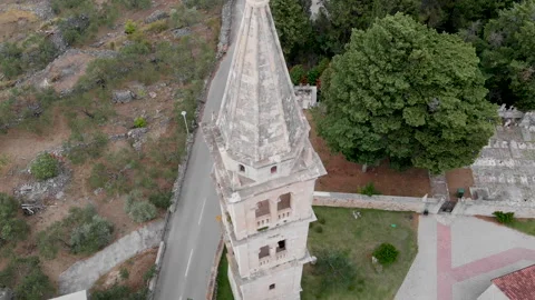 Drone view of a bell tower in the mountains 08 Video stock 139761668