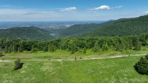 Drone view on Beskid mountains, Mountain biking in the mountains. Summer gr.. Video stock 309942046