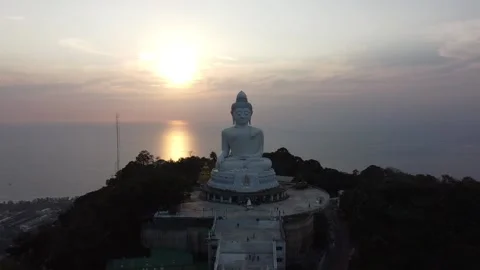 Drone view of the Big Buddha statue on the hill at sunset Stock-Footage 170656893