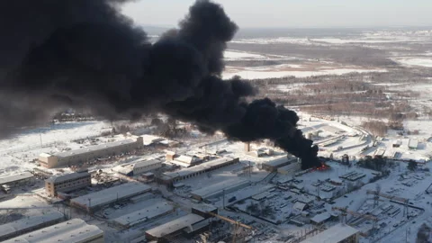Drone view of big fire, black smoke on burning industrial building at a factory Stock Footage 256417723