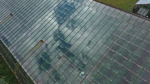 Drone view of big industrial hothouses with growing plants inside Vídeo Stock 253409151