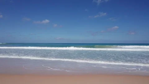 Drone view of big ocean waves and white clouds Video stock 245840596