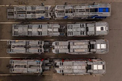 Drone view of big rig semi truck empty car haulers. Stock Photos