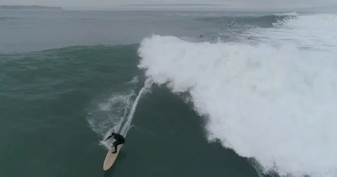 Drone view of a big wave surfer in Spain Stock Footage 111835394