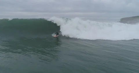 Drone view of a big wave surfer in Spain Stock Footage 111835427