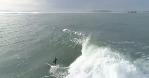 Drone view of a big wave surfer in Spain Stock Footage 111835455