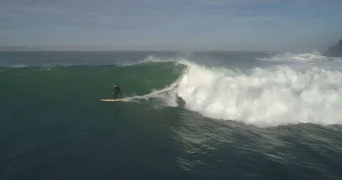 Drone view of a big wave surfer in Spain Stock Footage 111835515