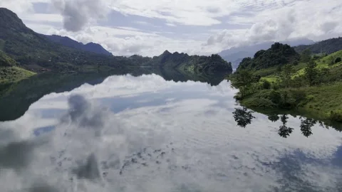 Drone view of Black River with sky reflection and moutains, Vietnam – 4K Video stock 325036179