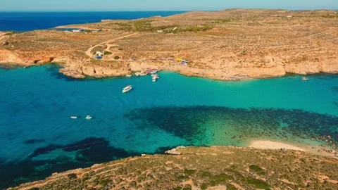 Drone view of Blue lagoon on Comino island. Mediterranean sea, Malta island Stock Footage 274807077