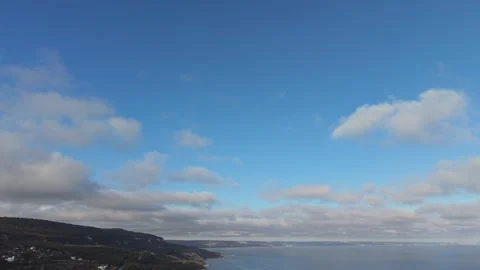 Drone view of blue sky with clouds above wide horizon Stock Footage 320790792