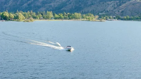 Drone view of a boat moving at high speed Stock Footage 247903424