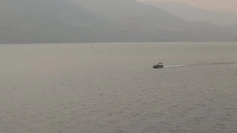 Drone view of a boat moving at high speed at sunset. High quality 4k footage Stock Footage 249133185