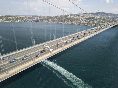 Drone View of Bosphorus Bridge Deck with Boats and Mosque Stock Photos