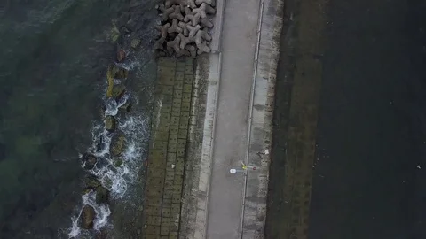 Drone view of a brdige and Dinh Cau Temple in vietnam Stock Footage 83875676