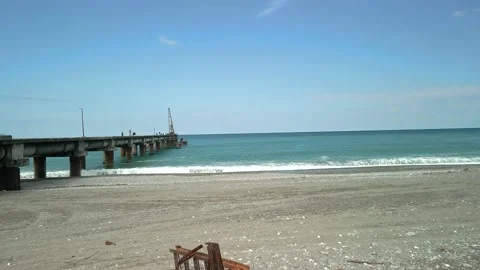Drone view of the bridge in the beautiful black sea on which there is a crane Video stock 237597649