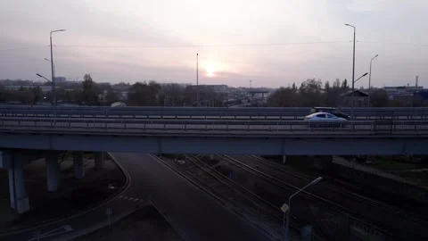 Drone view of the bridge passing through the city. Stock Footage 255564462