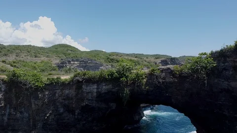 Drone view of broken beach panning down shot,Nusa Penida Island,Indonesia Stock Footage 125843437