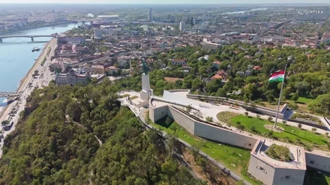 Drone view of Budapest Citadella and Liberty Statue above Danube River Stock Footage 345673742