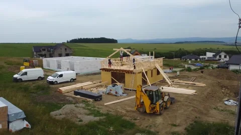 Drone view of building a house in a new modern part of town in beautiful nature. Stockbeeldmateriaal 249695752