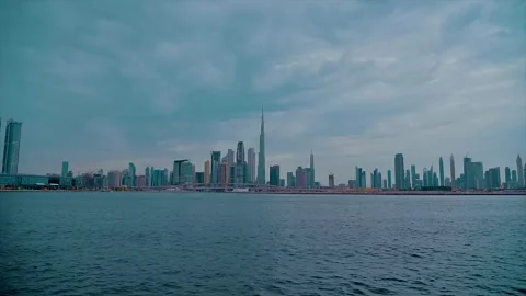 Drone view of Burj Khalifa and Dubai Skyline under Cloudy Sky Stock Footage 149046965