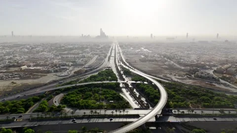 Drone view of busy complex road junction in the hazed mornig Saudi Arabia Riyadh Stock Footage 285328547