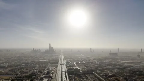 Drone view of busy complex road junction in the hazed mornig Saudi Arabia Riyadh Stockbeeldmateriaal 285328678