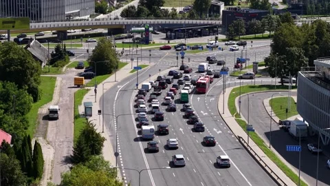 Drone view of a busy multi-lane city intersection with steady car traffic, turn Stock Footage 327428156