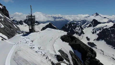 Drone view of cable car station on the top of Titlis mountain in Switzerland  Stock Footage 115973406