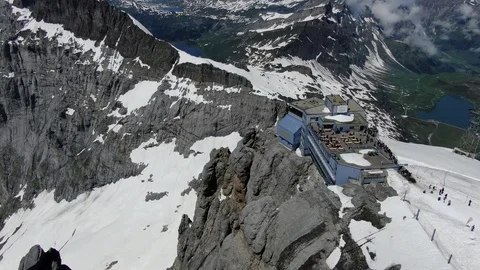 Drone view of cable car station on the top of Titlis mountain in Switzerland  Stock Footage 115973429
