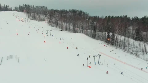 Drone view on cable way in ski resort. Ski lift elevator transporting skiers and Stock Footage 168149787