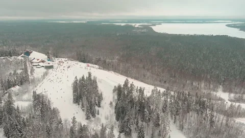 Drone view on cable way in ski resort. Ski lift elevator transporting skiers and Video stock 168193373