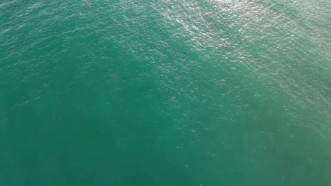 Drone View of Calm Emerald Green Sea Surface with Ripples Stock Footage 320930761