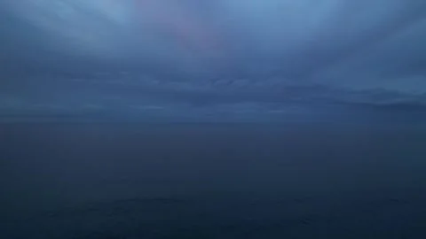 Drone view of calm open sea and cloudy sky at twilight Stock-Footage 317447817