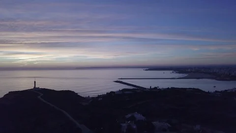 Drone view of the of the calming ocean at sunset Stock Footage 128407446