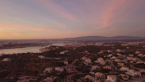 Drone view of the of the calming ocean at sunset Stock Footage 128407458