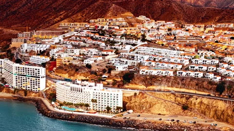Drone view captures coastal development in Gran Canaria, Spain Stock Footage 296921809