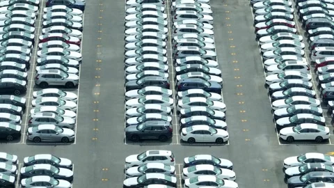 This drone view captures a large automobile storage area. Stock Footage 306734689