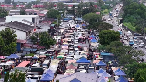 Drone view captures pasar malam with illuminated stalls 스톡 동영상 332089508