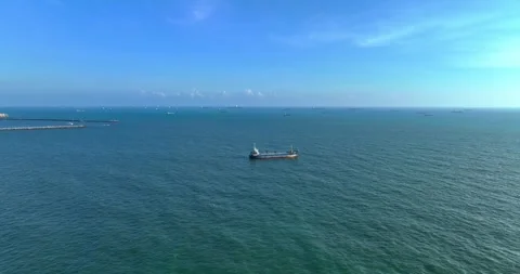 Drone view of a cargo ship moored in the open sea Stock Footage 245465755