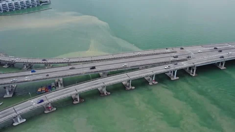 Drone View of Cars Crossing Elevated Bridge and Highway Interchange Stock Footage 345381885