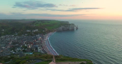 Drone view of the chalk cliffs on the seashore. People walk along the green Video stock 240851520