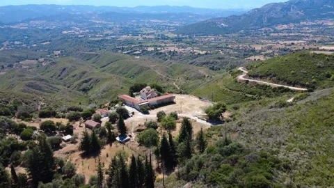 Drone view of Christian monastery surrounded by cypress trees in Greece Video stock 317296764